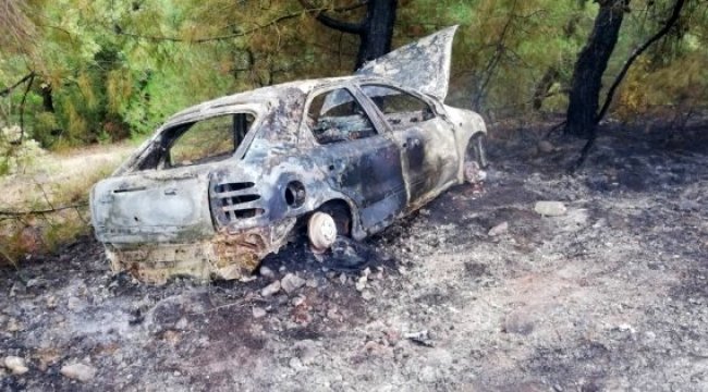 Virajı alamayarak ormana uçan otomobil alev aldı