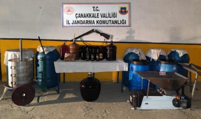 Gökçeada'da, bağ evinde 1355 litre sahte şarap ele geçirildi