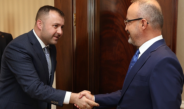 Ezine Belediye Başkanı Güray Yüksel, Turan'ı ziyaret etti.